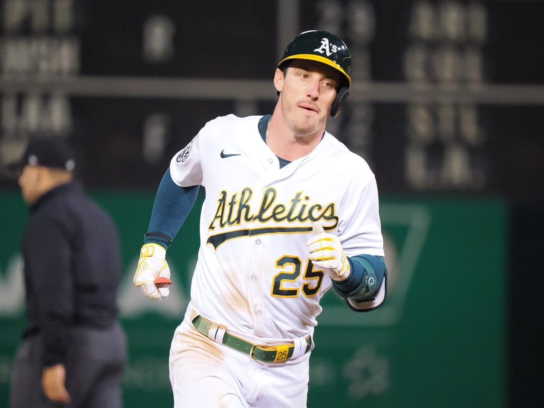 Apr 28, 2023; Oakland, California, USA; Oakland Athletics designated hitter Brent Rooker (25) rounds the bases on a. Two-run home run against the Cincinnati Reds during the ninth inning at Oakland Coliseum. Mandatory Credit: Kelley L Cox-USA TODAY Sports