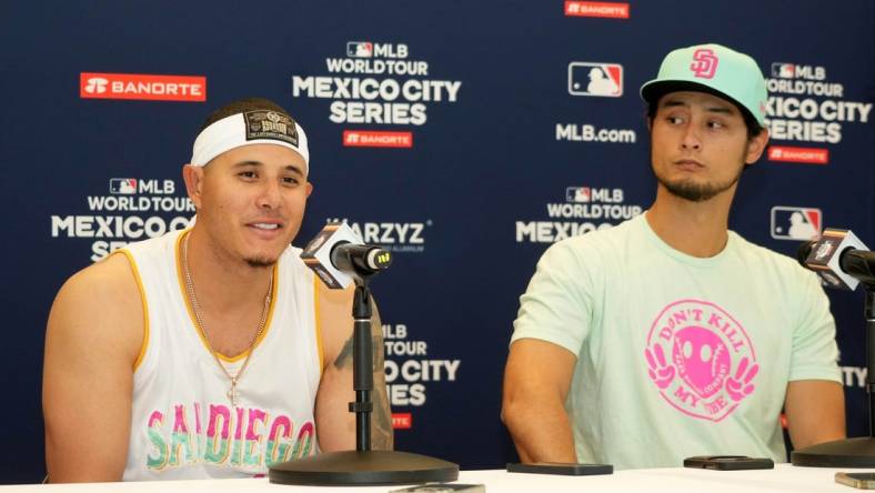 Apr 29, 2023; Mexico City, Mexico; San Diego Padres third baseman Manny Machado (left) and pitcher Yu Darvish at a press conference during a MLB World Tour game at Estadio Alfredo Harp Helu. Mandatory Credit: Kirby Lee-USA TODAY Sports