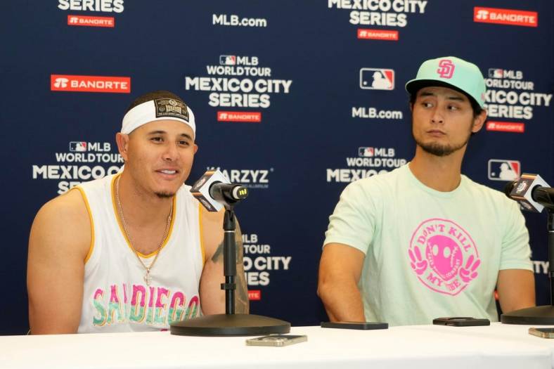 Apr 29, 2023; Mexico City, Mexico; San Diego Padres third baseman Manny Machado (left) and pitcher Yu Darvish at a press conference during a MLB World Tour game at Estadio Alfredo Harp Helu. Mandatory Credit: Kirby Lee-USA TODAY Sports