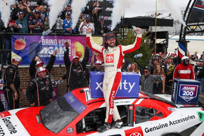 Apr 29, 2023; Dover, Delaware, USA; NASCAR Xfinity Series driver Ryan Truex (19) celebrates in victory lane after winning the A-GAME 200 at Dover Motor Speedway. Mandatory Credit: Matthew OHaren-USA TODAY Sports