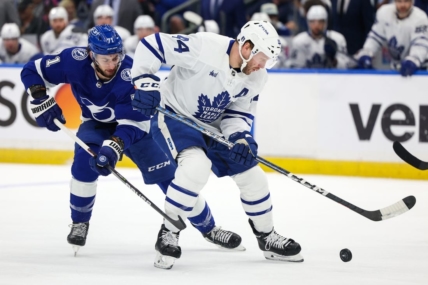 Apr 29, 2023; Tampa, Florida, USA; Toronto Maple Leafs defenseman Morgan Rielly (44) keeps the puck from Tampa Bay Lightning center Anthony Cirelli (71) in the first period  during game six of the first round of the 2023 Stanley Cup Playoffs at Amalie Arena. Mandatory Credit: Nathan Ray Seebeck-USA TODAY Sports