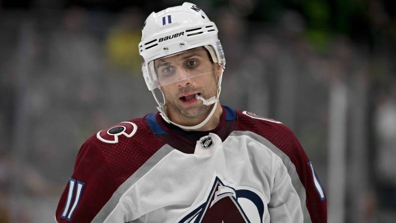 Mar 4, 2023; Dallas, Texas, USA; Colorado Avalanche center Andrew Cogliano (11) in action during the game between the Dallas Stars and the Colorado Avalanche at the American Airlines Center. Mandatory Credit: Jerome Miron-USA TODAY Sports