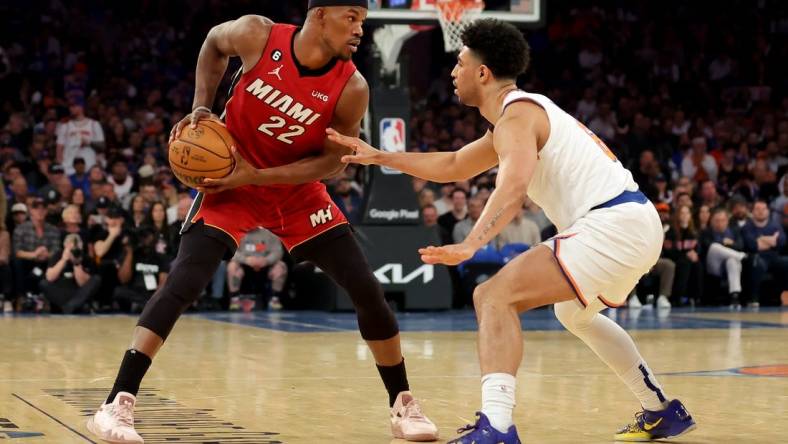 Apr 30, 2023; New York, New York, USA; Miami Heat forward Jimmy Butler (22) controls the ball against New York Knicks guard Quentin Grimes (6) during the second quarter of game one of the 2023 NBA Eastern Conference semifinal playoffs at Madison Square Garden. Mandatory Credit: Brad Penner-USA TODAY Sports