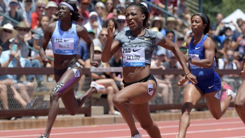 Jun 30, 2019; Stanford, CA, USA; Marie-Josee Ta Lou (CIV) defeats Tori Bowie (USA) and Shelly-Ann Fraser-Pryce (JAM) to win the women's 100m in 11.02 during the 45th Prefontaine Classic at Cobb Track & Angell Field. Mandatory Credit: Kirby Lee-USA TODAY Sports