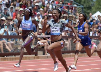 Jun 30, 2019; Stanford, CA, USA; Marie-Josee Ta Lou (CIV) defeats Tori Bowie (USA) and Shelly-Ann Fraser-Pryce (JAM) to win the women's 100m in 11.02 during the 45th Prefontaine Classic at Cobb Track & Angell Field. Mandatory Credit: Kirby Lee-USA TODAY Sports