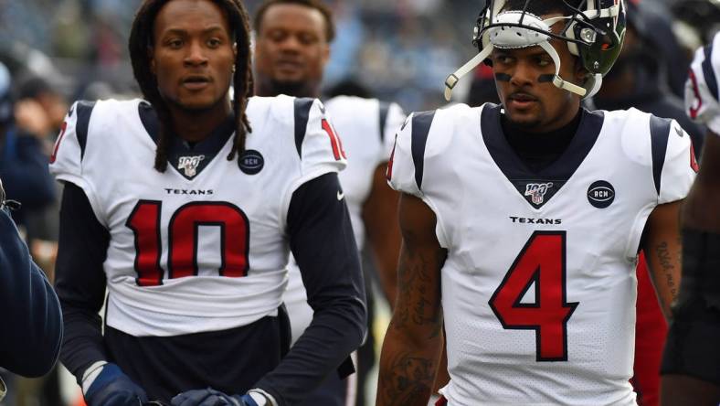 Dec 15, 2019; Nashville, TN, USA; Houston Texans quarterback Deshaun Watson (4) and Houston Texans wide receiver DeAndre Hopkins (10) walk off the field after warmups before the game against the Tennessee Titans at Nissan Stadium. Mandatory Credit: Christopher Hanewinckel-USA TODAY Sports