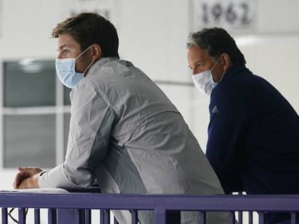 Jul 13, 2020; Toronto, Ontario, Canada; Toronto Maple Leafs general manager Kyle Dubas (left) and president Brendan Shanahan (right) watch a NHL workout at the Ford Performance Centre. Mandatory Credit: John E. Sokolowski-USA TODAY Sports