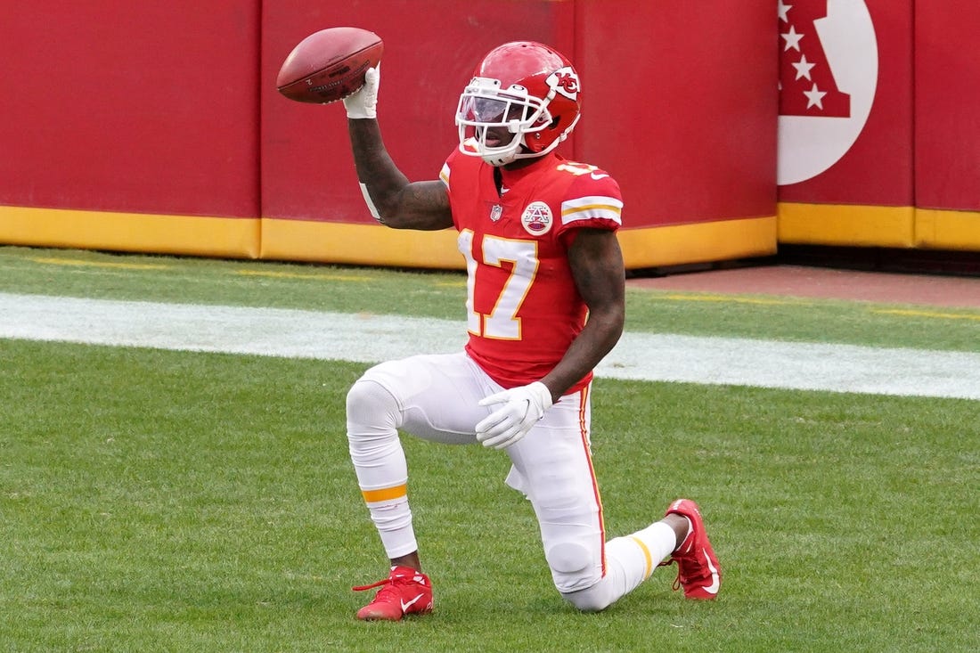 Dec 27, 2020; Kansas City, Missouri, USA; Kansas City Chiefs wide receiver Mecole Hardman (17) makes a fair catch in the end zone during the game against the Atlanta Falcons at Arrowhead Stadium. Mandatory Credit: Denny Medley-USA TODAY Sports