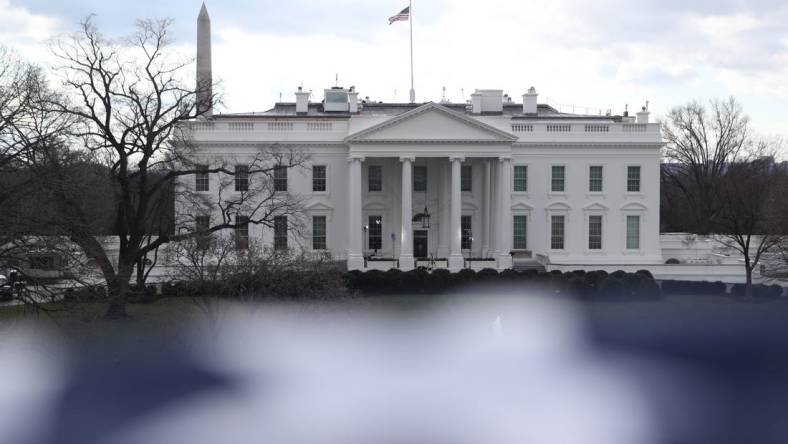 Jan 20, 2021; Washington, DC, USA; View of The White House from Lafayette Park before the parade at the 2021 Presidential Inauguration of President Joe Biden and Vice President Kamala Harris at the U.S. Capitol. Mandatory Credit: Jerry Habraken-USA TODAY