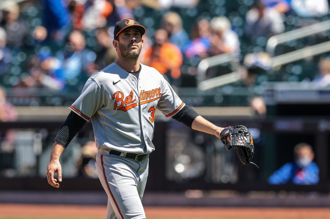 May 12, 2021; New York City, New York, USA; Baltimore Orioles starting pitcher Matt Harvey (32) looks up while walking off of the field during the fifth inning against the New York Mets at Citi Field. Mandatory Credit: Vincent Carchietta-USA TODAY Sports