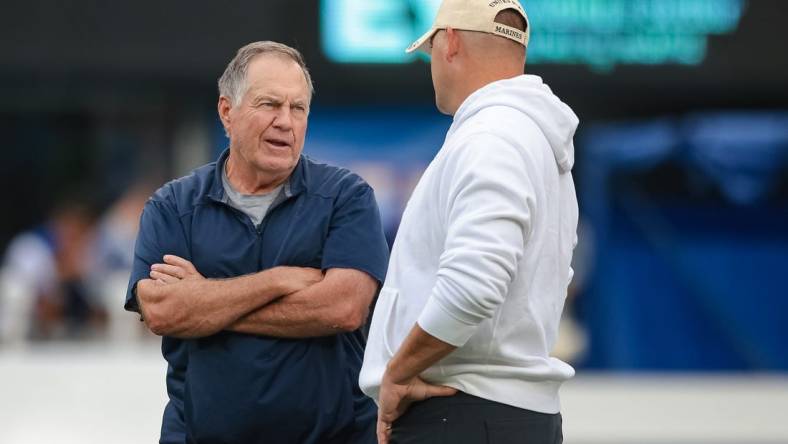 Aug 29, 2021; East Rutherford, New Jersey, USA; New England Patriots head coach Bill Belichick, left, talks with New York Giants head coach Joe Judge before the game at MetLife Stadium. Mandatory Credit: Vincent Carchietta-USA TODAY Sports