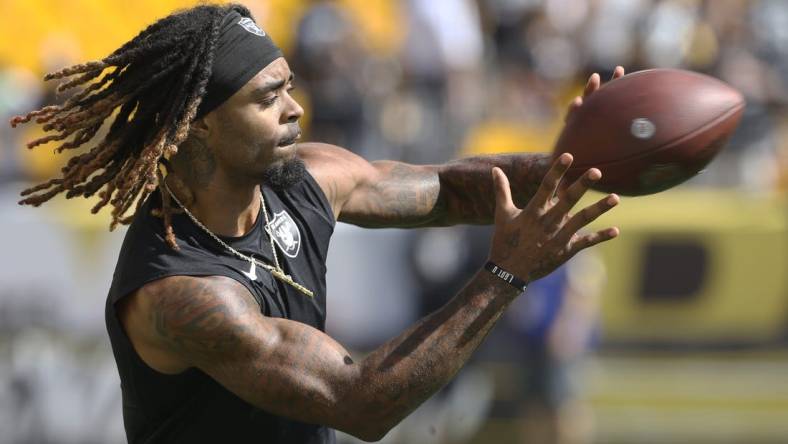 Sep 19, 2021; Pittsburgh, Pennsylvania, USA;  Las Vegas Raiders cornerback Damon Arnette (20) warms up before the game against the Pittsburgh Steelers at Heinz Field. Mandatory Credit: Charles LeClaire-USA TODAY Sports