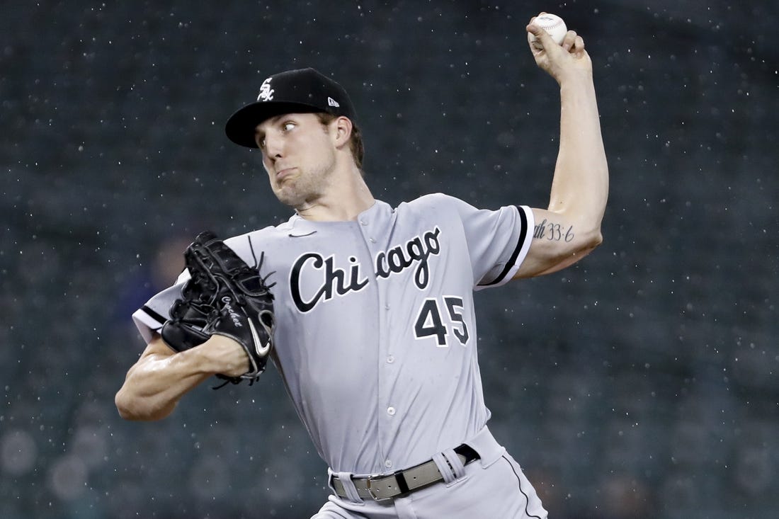 Sep 20, 2021; Detroit, Michigan, USA; Chicago White Sox relief pitcher Garrett Crochet (45) throws in the rain during the sixth inning against the Detroit Tigers at Comerica Park. Mandatory Credit: Raj Mehta-USA TODAY Sports