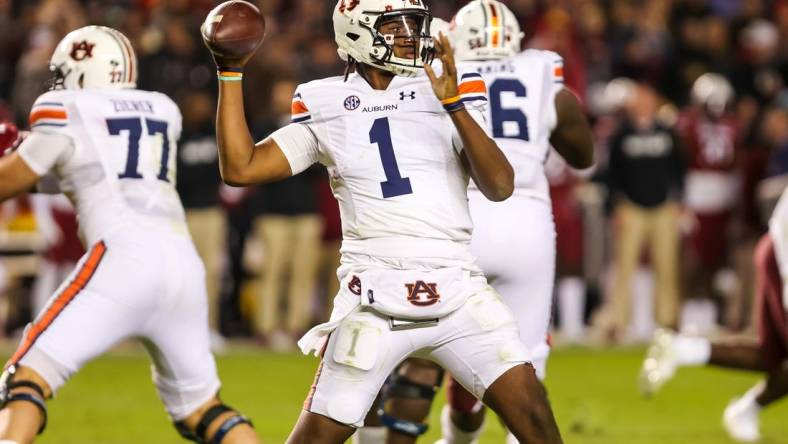 Nov 20, 2021; Columbia, South Carolina, USA; Auburn Tigers quarterback TJ Finley (1) passes against the South Carolina Gamecocks in the third quarter at Williams-Brice Stadium. Mandatory Credit: Jeff Blake-USA TODAY Sports