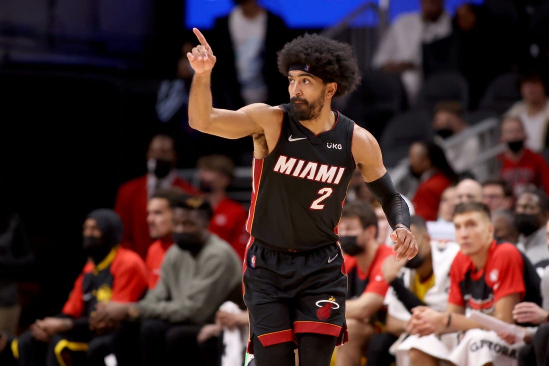 Jan 12, 2022; Atlanta, Georgia, USA; Miami Heat guard Gabe Vincent (2) reacts after a basket during the fourth quarter against the Atlanta Hawks at State Farm Arena. Mandatory Credit: Jason Getz-USA TODAY Sports