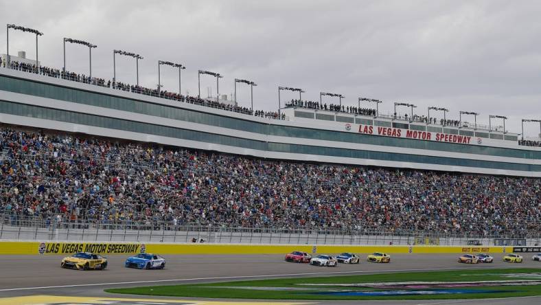 Mar 6, 2022; Las Vegas, Nevada, USA; General view as NASCAR Cup Series driver Christopher Bell (20) leads driver Kyle Larson (5) and a group during the Pennzoil 400 at Las Vegas Motor Speedway. Mandatory Credit: Gary A. Vasquez-USA TODAY Sports