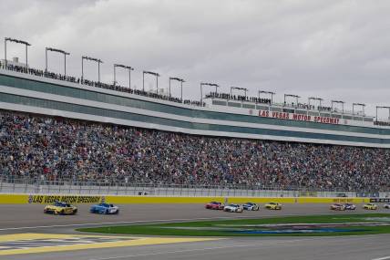 Mar 6, 2022; Las Vegas, Nevada, USA; General view as NASCAR Cup Series driver Christopher Bell (20) leads driver Kyle Larson (5) and a group during the Pennzoil 400 at Las Vegas Motor Speedway. Mandatory Credit: Gary A. Vasquez-USA TODAY Sports