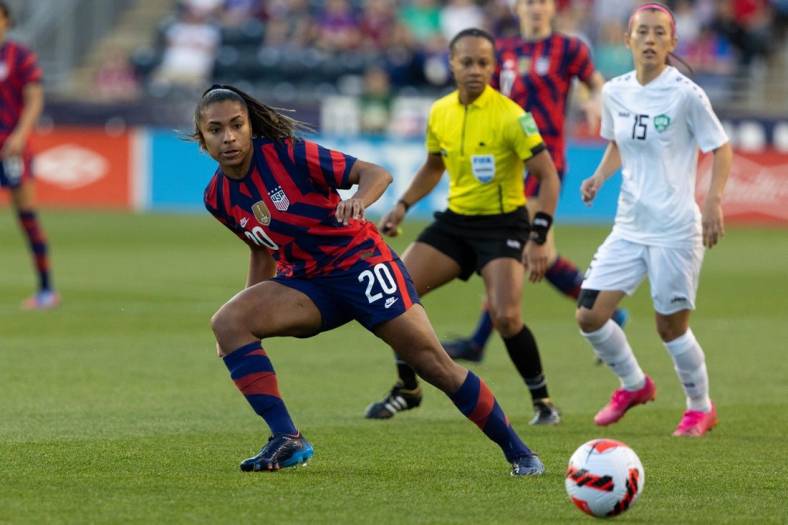 Apr 12, 2022; Chester, Pennsylvania, USA; United States midfielder Catarina Macario (20) passes the ball against Uzbekistan during the first half of an international friendly women's soccer match at Subaru Park. Mandatory Credit: Bill Streicher-USA TODAY Sports