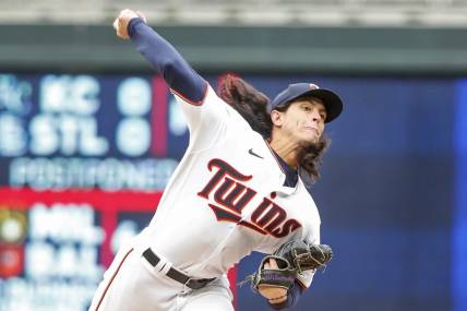 Apr 13, 2022; Minneapolis, Minnesota, USA; Minnesota Twins relief pitcher Dereck Rodriguez (32) throws to the Los Angeles Dodgers in the eighth inning at Target Field. Mandatory Credit: Bruce Kluckhohn-USA TODAY Sports