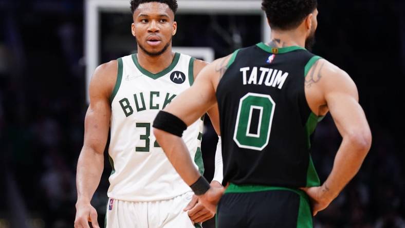 May 1, 2022; Boston, Massachusetts, USA; Milwaukee Bucks forward Giannis Antetokounmpo (34) and Boston Celtics forward Jayson Tatum (0) on the court in the second half during game one of the second round for the 2022 NBA playoffs at TD Garden. Mandatory Credit: David Butler II-USA TODAY Sports