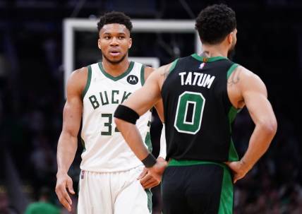 May 1, 2022; Boston, Massachusetts, USA; Milwaukee Bucks forward Giannis Antetokounmpo (34) and Boston Celtics forward Jayson Tatum (0) on the court in the second half during game one of the second round for the 2022 NBA playoffs at TD Garden. Mandatory Credit: David Butler II-USA TODAY Sports