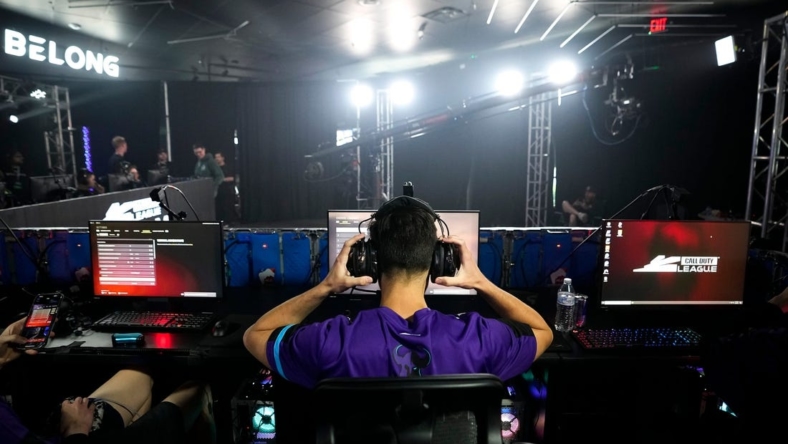 Dillon "Attach" Price of Minnesota R  KKR adjusts his headphones prior to the matchup against OpTic Texas during the Call of Duty League Pro-Am Classic esports tournament at Belong Gaming Arena in Columbus on May 6, 2022.

Call Of Duty Esports Tournament