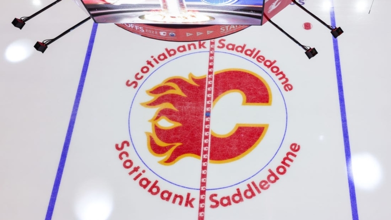 May 18, 2022; Calgary, Alberta, CAN; General view of the Calgary Flames logo on the ice prior to the game between the Calgary Flames and the Edmonton Oilers in game one of the second round of the 2022 Stanley Cup Playoffs at Scotiabank Saddledome. Mandatory Credit: Sergei Belski-USA TODAY Sports