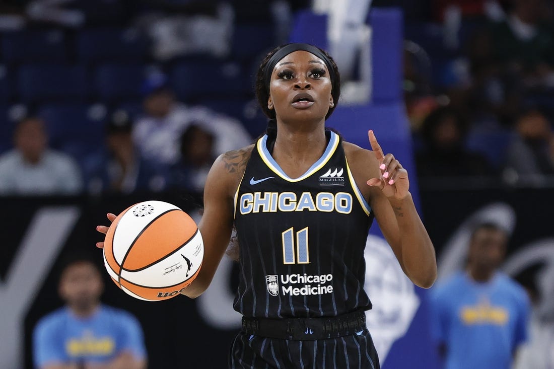 May 24, 2022; Chicago, Illinois, USA; Chicago Sky guard Dana Evans (11) brings the ball up court against the Indiana Fever during the first half at Wintrust Arena. Mandatory Credit: Kamil Krzaczynski-USA TODAY Sports