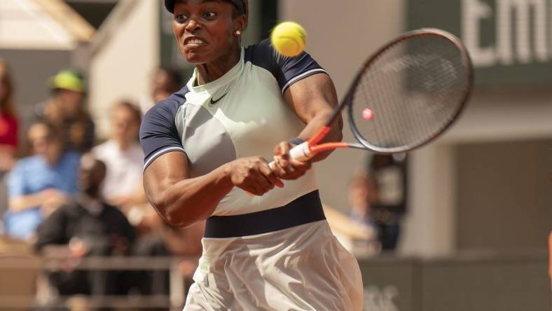 May 31, 2022; Paris, France; Sloane Stephens (USA) returns a shot during her match against Coco Gauff (USA) on day 10 of the French Open at Stade Roland-Garros. Mandatory Credit: Susan Mullane-USA TODAY Sports