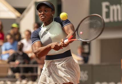 May 31, 2022; Paris, France; Sloane Stephens (USA) returns a shot during her match against Coco Gauff (USA) on day 10 of the French Open at Stade Roland-Garros. Mandatory Credit: Susan Mullane-USA TODAY Sports
