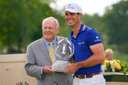 Jun 5, 2022; Dublin, Ohio, USA; Billy Horschel is awarded the trophy by Jack Nicklaus following his win in the final round of the Memorial Tournament at Muirfield Village Golf Club on June 5, 2022. Horschel won with a -13 for the tournament. Mandatory Credit: Adam Cairns-The Columbus Dispatch

Pga Memorial Tournament Final Round