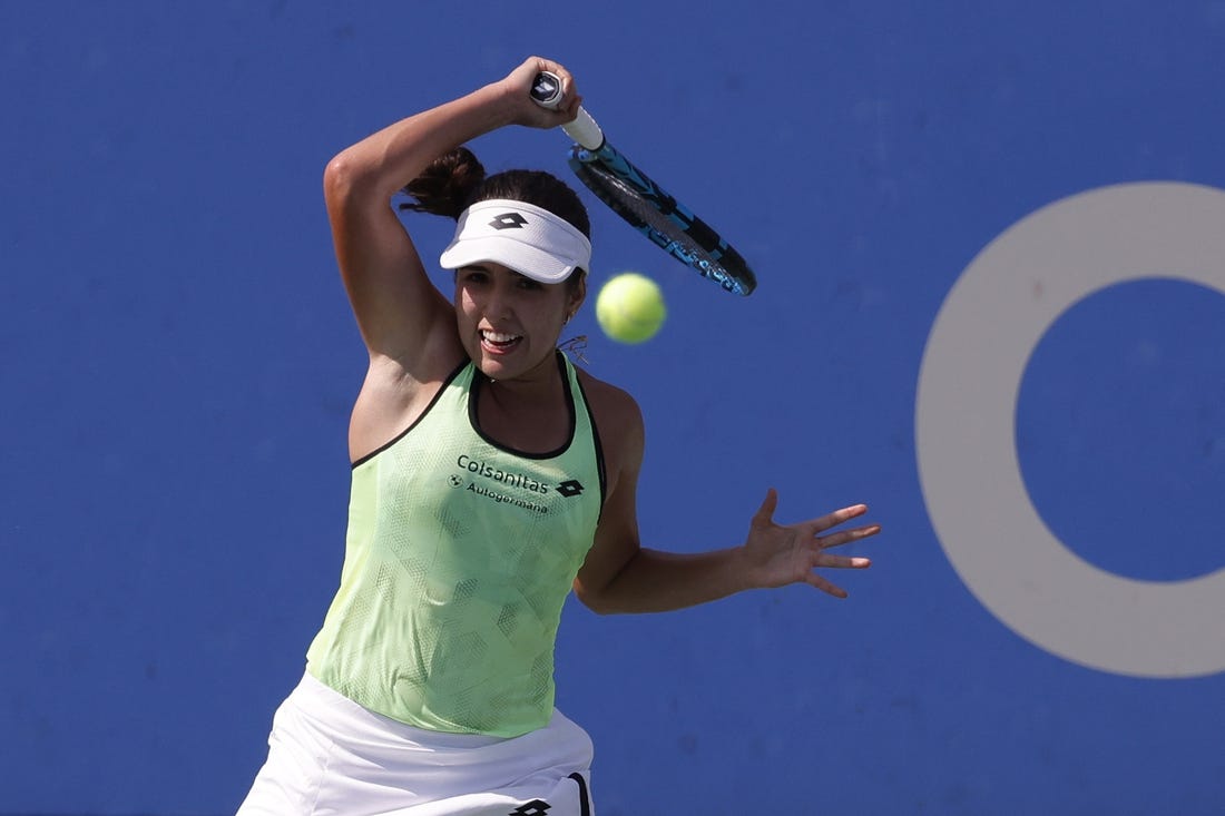 Aug 4, 2022; Washington, DC, USA;  Camila Osorio (COL) hits a forehand against Emma Raducanu (GBR) (not pictured) on day four of the Citi Open at Rock Creek Park Tennis Center. Mandatory Credit: Geoff Burke-USA TODAY Sports