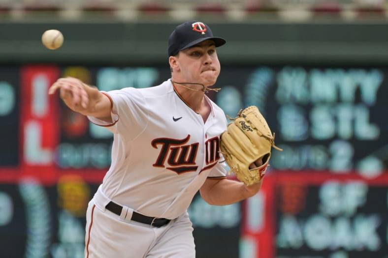 Aug 7, 2022; Minneapolis, Minnesota, USA; Minnesota Twins starting pitcher Cole Sands (77) throws a pitch against the Toronto Blue Jays during the sixth inning at Target Field. Mandatory Credit: Jeffrey Becker-USA TODAY Sports