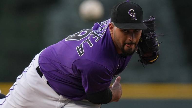 Aug 12, 2022; Denver, Colorado, USA; Colorado Rockies starting pitcher Antonio Senzatela (49) delivers a pitch against the Arizona Diamondbacks n the first inning at Coors Field. Mandatory Credit: Ron Chenoy-USA TODAY Sports