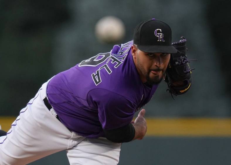 Aug 12, 2022; Denver, Colorado, USA; Colorado Rockies starting pitcher Antonio Senzatela (49) delivers a pitch against the Arizona Diamondbacks n the first inning at Coors Field. Mandatory Credit: Ron Chenoy-USA TODAY Sports