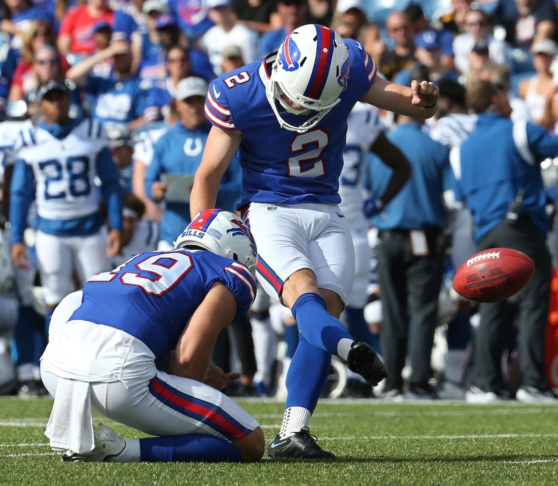 With Buffalo punter Matt Araiza (19) holding, kicker Tyler Bass (2) kicks a field goal during the Bills  27-24 win over Indianapolis in their preseason game Saturday, Aug. 13, 2022 at Highmark Stadium in Orchard Park.

Sd 081322 Bills 76 Spts