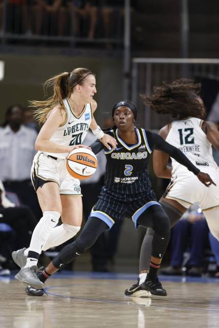 Aug 20, 2022; Chicago, Illinois, USA; New York Liberty guard Sabrina Ionescu (20) drives to the basket against Chicago Sky guard Kahleah Copper (2) during the first half of Game 2 of the first round of the WNBA playoffs at Wintrust Arena. Mandatory Credit: Kamil Krzaczynski-USA TODAY Sports