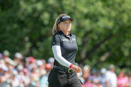 Aug 28, 2022; Ottawa, Ontario, CAN; Brooke Henderson from Canada  walks on the 18th hole green during the final round of the CP Women's Open golf tournament. Mandatory Credit: Marc DesRosiers-USA TODAY Sports