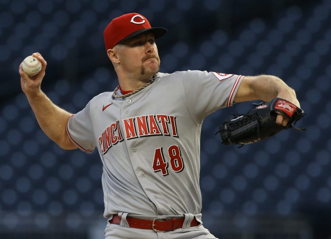 Sep 26, 2022; Pittsburgh, Pennsylvania, USA; Cincinnati Reds starting pitcher Chase Anderson (48) throws a pitch against the Pittsburgh Pirates during the first inning at PNC Park. Mandatory Credit: Charles LeClaire-USA TODAY Sports