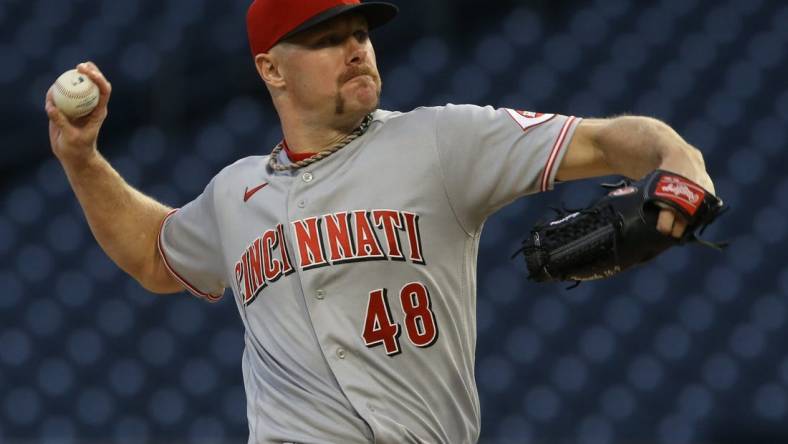 Sep 26, 2022; Pittsburgh, Pennsylvania, USA; Cincinnati Reds starting pitcher Chase Anderson (48) throws a pitch against the Pittsburgh Pirates during the first inning at PNC Park. Mandatory Credit: Charles LeClaire-USA TODAY Sports