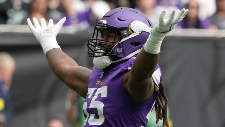 Oct 2, 2022; London, United Kingdom; Minnesota Vikings linebacker Za'Darius Smith (55) celebrates after a sack in the first quarter against the New Orleans Saints during an NFL International Series game at Tottenham Hotspur Stadium. Mandatory Credit: Kirby Lee-USA TODAY Sports
