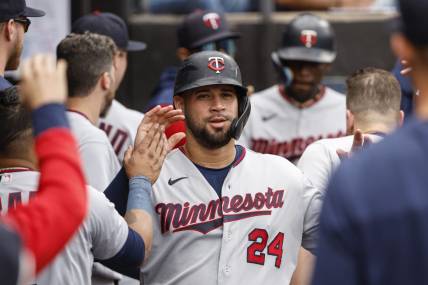 Oct 5, 2022; Chicago, Illinois, USA; Minnesota Twins catcher Gary Sanchez (24) celebrates with teammates after scoring against the Chicago White Sox during the second inning at Guaranteed Rate Field. Mandatory Credit: Kamil Krzaczynski-USA TODAY Sports