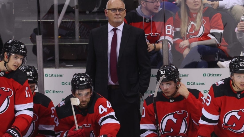 Oct 15, 2022; Newark, New Jersey, USA; New Jersey Devils head coach Lindy Ruff watches the action against the Detroit Red Wings during the third period at Prudential Center. Mandatory Credit: Ed Mulholland-USA TODAY Sports