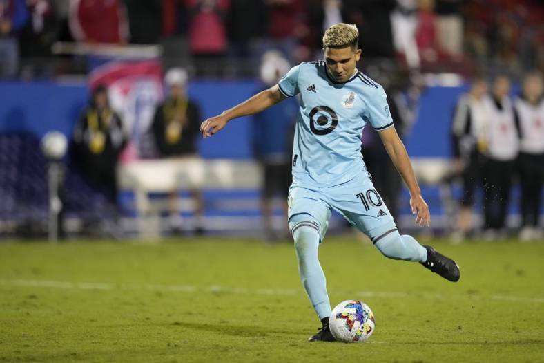 Oct 17, 2022; Frisco, Texas, US; Minnesota United midfielder Emanuel Reynoso (10) takes a penalty kick during the penalty shootout against the FC Dallas at Toyota Stadium. Mandatory Credit: Chris Jones-USA TODAY Sports