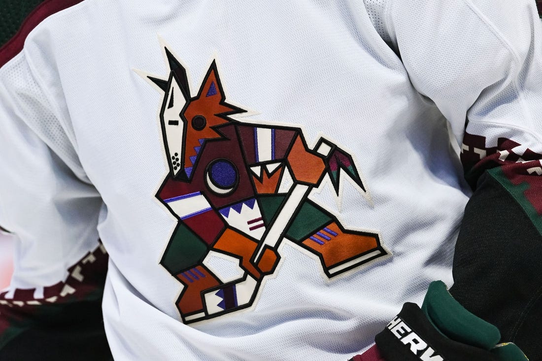 Oct 20, 2022; Montreal, Quebec, CAN; View of an Arizona Coyotes logo on a jersey worn by a member of the team during the third period at Bell Centre. Mandatory Credit: David Kirouac-USA TODAY Sports