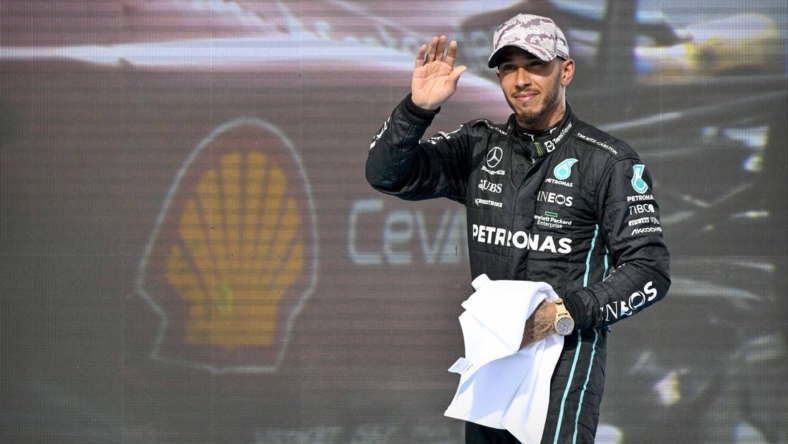 Oct 23, 2022; Austin, Texas, USA; Mercedes AMG Petronas Motorsport driver Lewis Hamilton (44) of Team Great Britain waves to the fans after the U.S. Grand Prix F1 race at Circuit of the Americas. Mandatory Credit: Jerome Miron-USA TODAY Sports