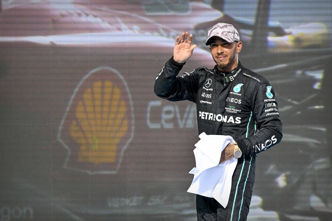 Oct 23, 2022; Austin, Texas, USA; Mercedes AMG Petronas Motorsport driver Lewis Hamilton (44) of Team Great Britain waves to the fans after the U.S. Grand Prix F1 race at Circuit of the Americas. Mandatory Credit: Jerome Miron-USA TODAY Sports