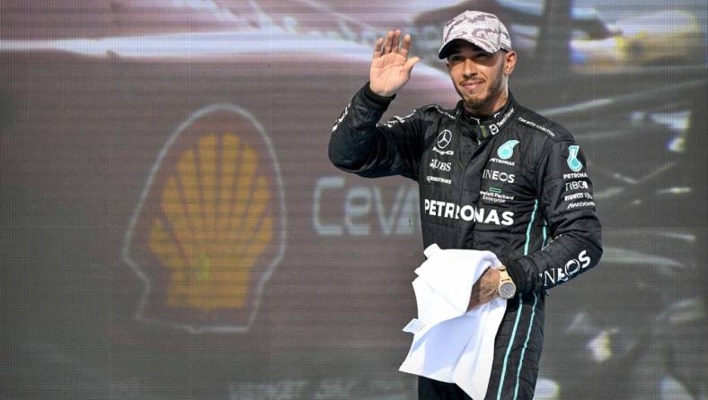 Oct 23, 2022; Austin, Texas, USA; Mercedes AMG Petronas Motorsport driver Lewis Hamilton (44) of Team Great Britain waves to the fans after the U.S. Grand Prix F1 race at Circuit of the Americas. Mandatory Credit: Jerome Miron-USA TODAY Sports