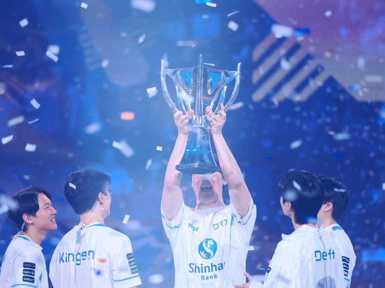 Nov 5, 2022; San Francisco, California, USA; DRX mid laner Kim "Zeka" Geon-woo holds up the Summoner's Cup Worlds 2022 trophy after winning the League of Legends World Championships against T1 at Chase Center. Mandatory Credit: Kelley L Cox-USA TODAY Sports