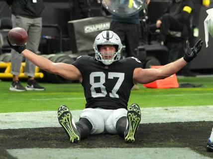 Nov 13, 2022; Paradise, Nevada, USA; Las Vegas Raiders tight end Foster Moreau (87) celebrates after scoring a touchdown against the Indianapolis Colts during the first half at Allegiant Stadium. Mandatory Credit: Stephen R. Sylvanie-USA TODAY Sports
